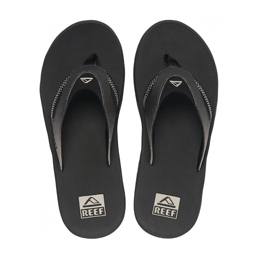 Schwarze Flip-Flops von Reef Fanning